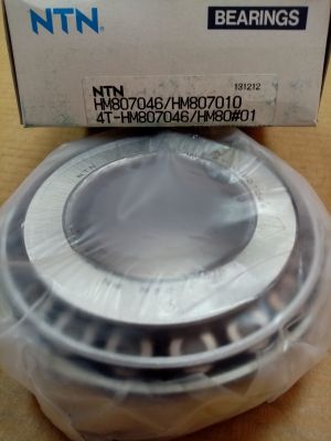 Bearing  4T-HM807046/HM807010 ( 50.80x104.775x36.512 ) NTN/Japan ,DANA 707066X;John Deere JD8255,JD8287,JD9078,JD9160,JD9165; New Holland 842876100